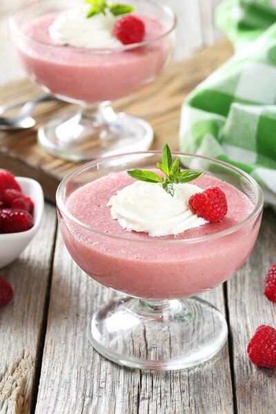 Sweet raspberry mousse in glass