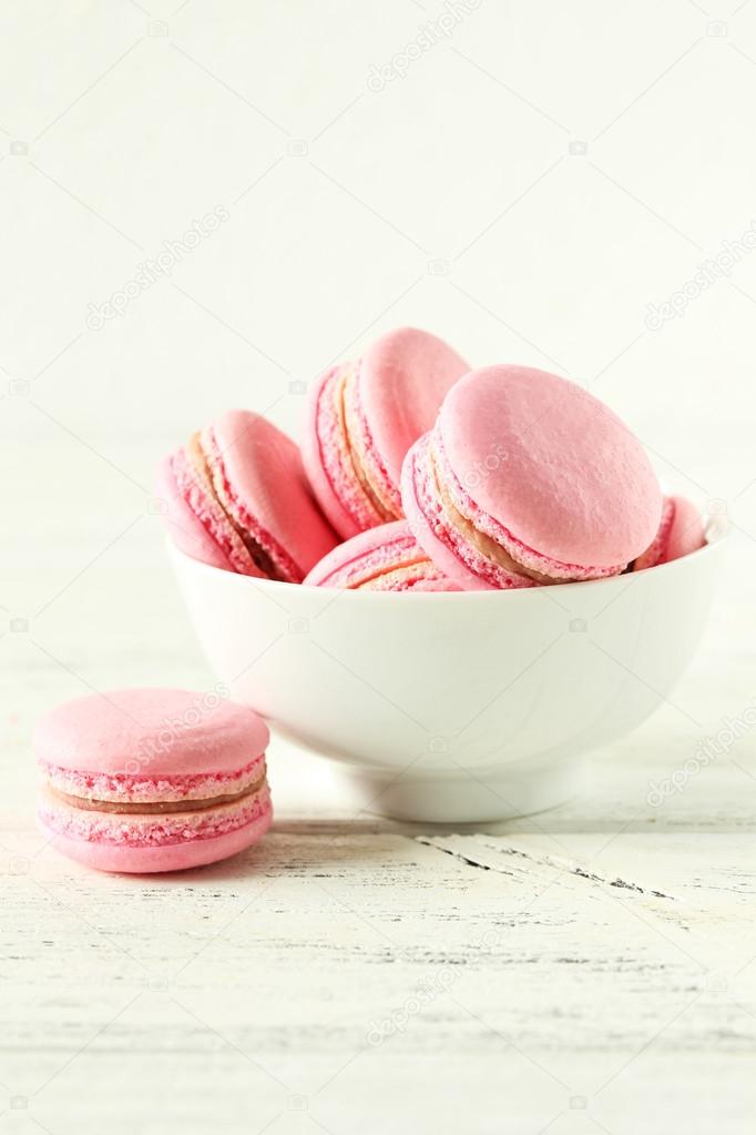 Pink macarons  in bowl