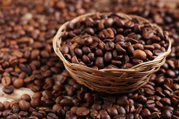 Roasted coffee beans in basket — Stock Photo, Image