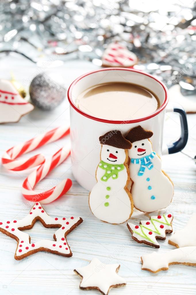 Christmas cookies with cup of hot coffee