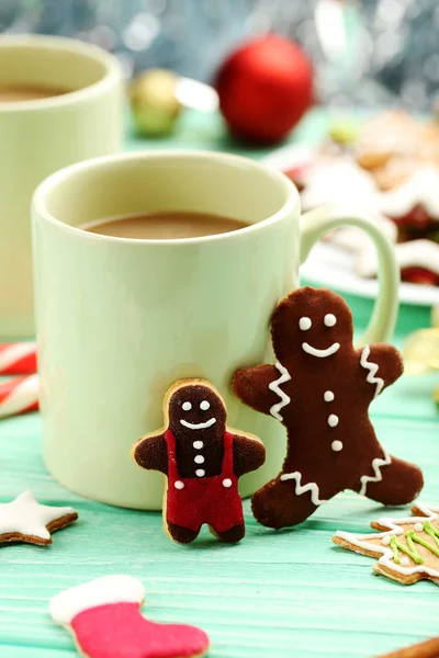 Gingerbread cookies with cup of hot coffee