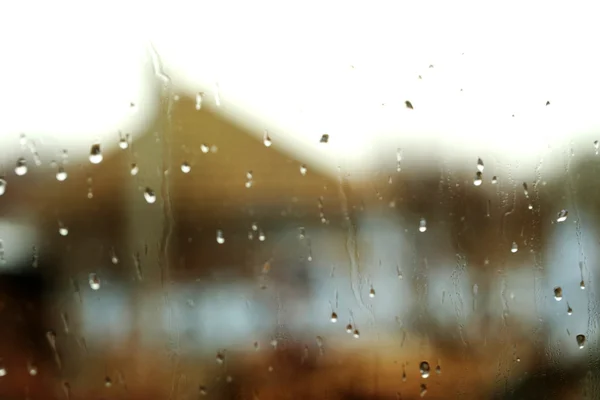 Gotas de lluvia sobre el vidrio —  Fotos de Stock