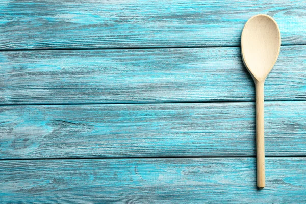 Wooden spoon on table — Stock Photo, Image