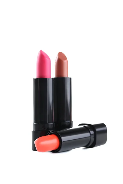 Rote, rosa und orangefarbene Lippenstifte — Stockfoto