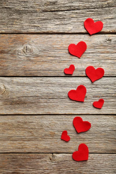 Red hearts on table — Stock Photo, Image