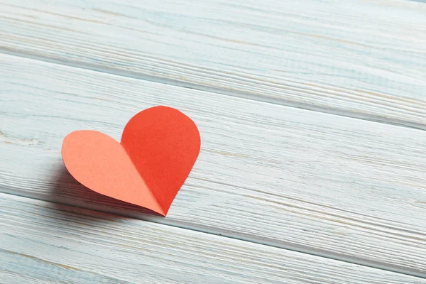 Red heart and sheet of paper — Stock Photo, Image