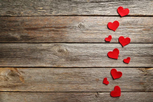 Red hearts on table — Stock Photo, Image