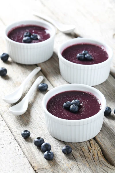 Delicious blueberry mousse in bowls — Stock Photo, Image