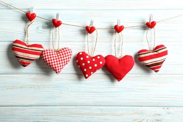 Love hearts hanging on rope — Stock Photo, Image