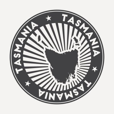 Tazmanya yuvarlak logosu dairesel adı ve ada vektörünün haritası olan Vintage seyahat rozeti