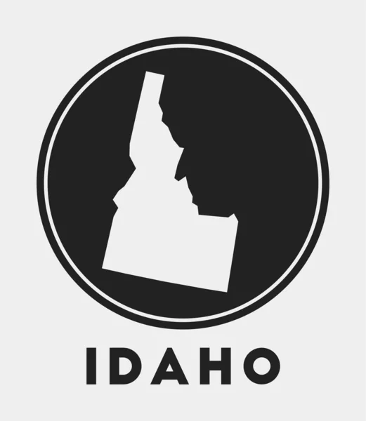 Idaho ikon Kerek logó velünk állami térkép és cím Stílusos Idaho jelvény térképpel Vektor — Stock Vector