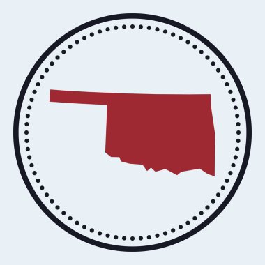 Oklahoma yuvarlak amblemi. Üzerinde eyalet haritası ve başlığı olan yuvarlak amblem.