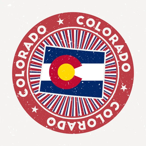 Colorado carimbo redondo Logo de nós estado com bandeira do estado emblema Vintage com texto circular e estrelas — Vetor de Stock