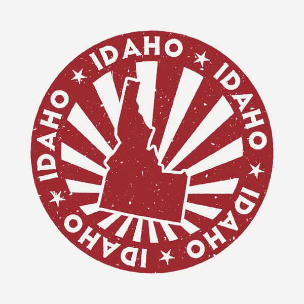 Timbro Idaho Viaggio timbro di gomma rosso con la mappa di noi stato vettoriale illustrazione Può essere utilizzato come — Vettoriale Stock