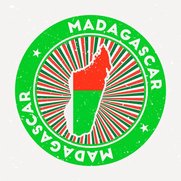 Madagaskar kulaté razítko Logo země s vlajkou Ročník odznaku s kruhovým textem a hvězdami — Stockový vektor