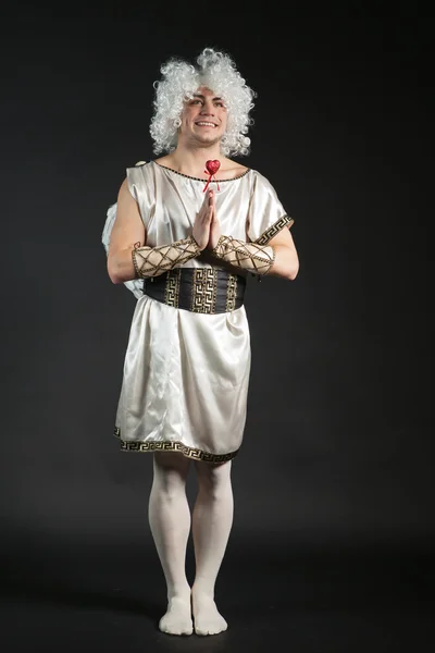 Male angel Cupid with a love heart. Valentines day — Stock Photo, Image