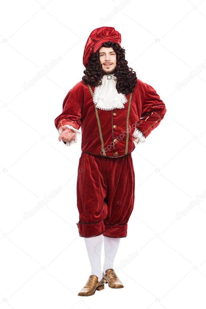 Portrait of the Middle Ages man in red costume isolated on white background