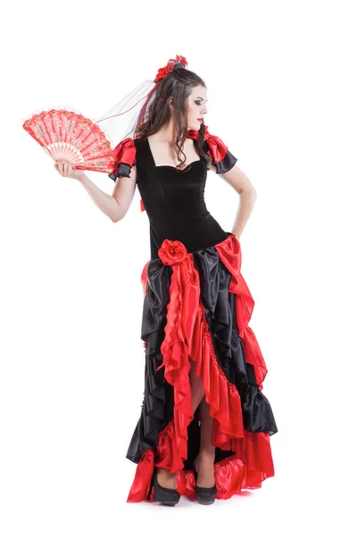 Nő a hagyományos spanyol Flamenco táncos táncol egy piros ruhás ventilátor — Stock Fotó