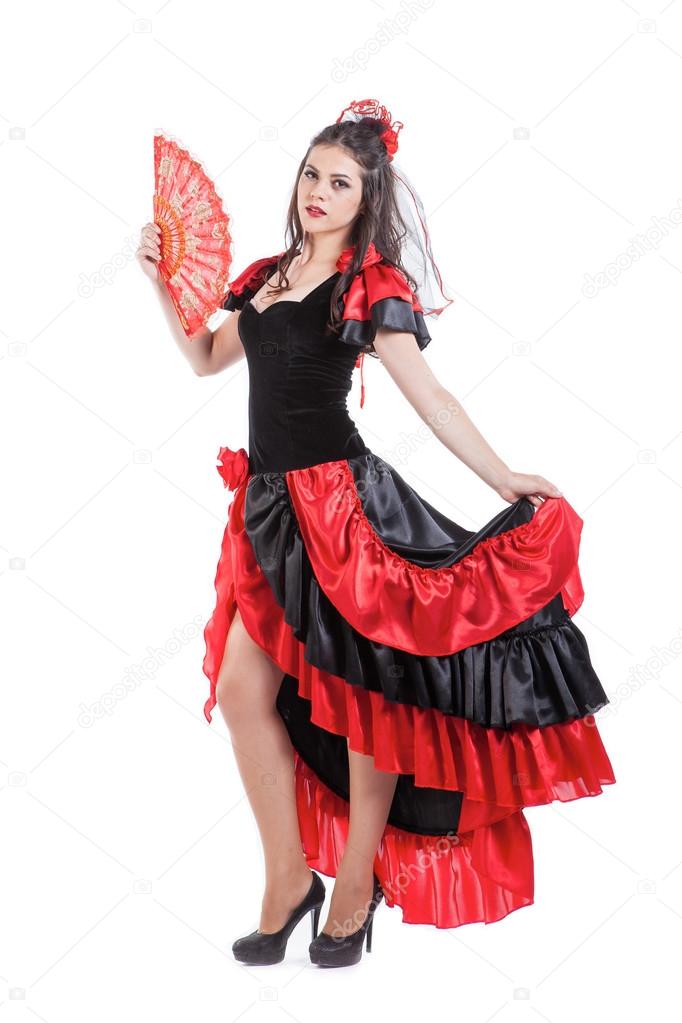 Traditional Spanish Flamenco Woman Dancer In A Red Dress With Fan