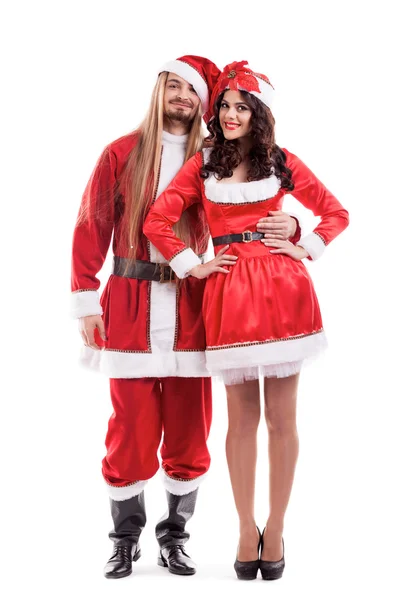 Attraktive festliche Paar Weihnachtsmann und Mädchen isoliert auf weiß. Herr und Frau Weihnachtsmann — Stockfoto