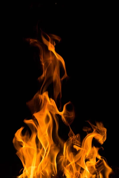 Real fire flames isolated on black — Stock Photo, Image