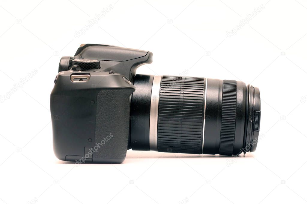 No logos digital SLR camera with 55-250 zoom lens with image stabilization. Right side view, studio shooting on a white background