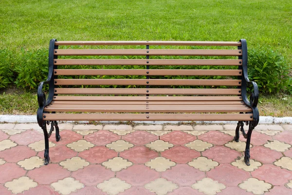 Decorative bench in public area. front view