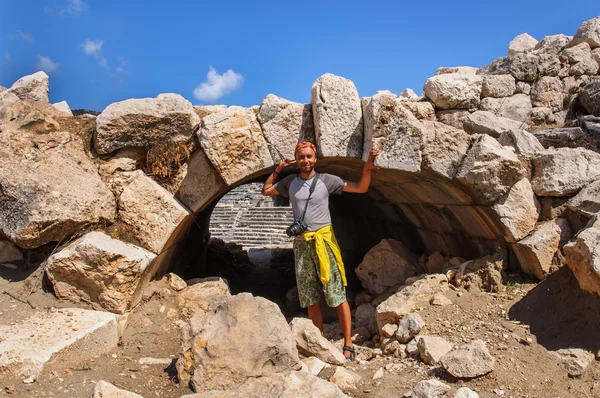 The man in Patara ancient city amphitheater in Antalya