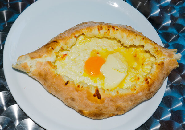 Georgian bread with egg and cottage cheese.