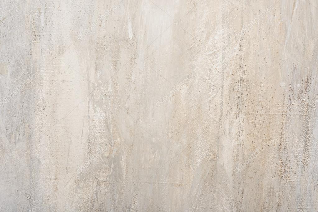 Grungy vintage painted wall old paint with cracks background texture
