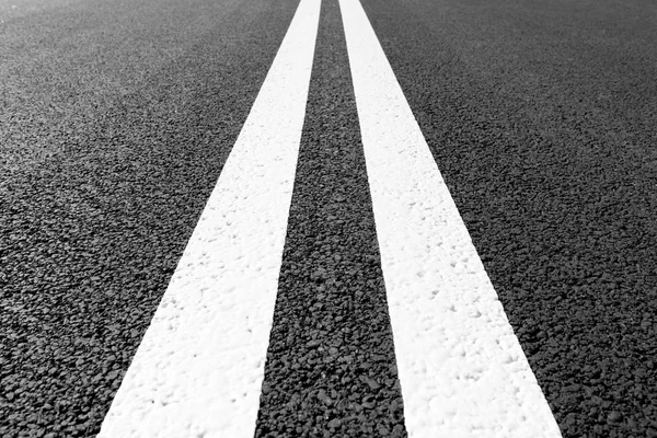 Asphalt road with marking lines white stripes — Stock Photo, Image