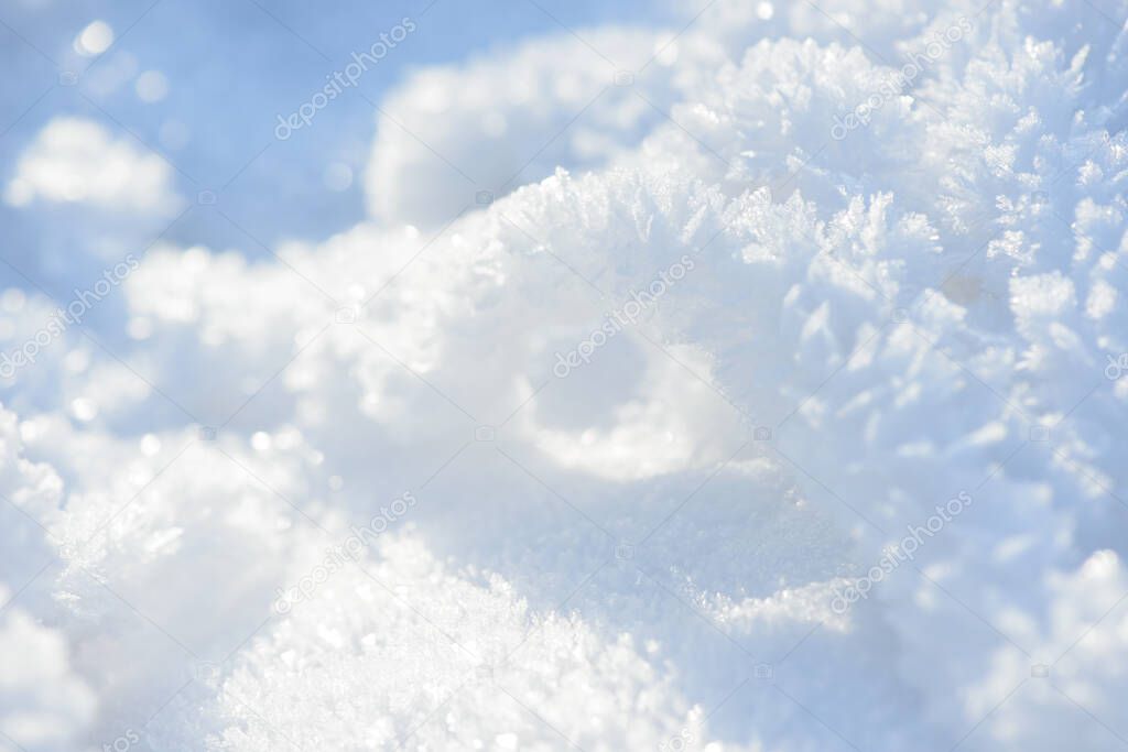 Hoarfrost background texture. Fresh ice and snow winter backdrop with snowflakes and mounds. Seasonal wallpaper. Frozen water geometrical shapes and figures. Cold weather atmospheric precipitation.