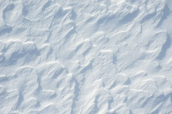 新雪の背景の質感 雪片や雪の塚と冬の背景 雪の塊 四季折々の風景詳細 — ストック写真