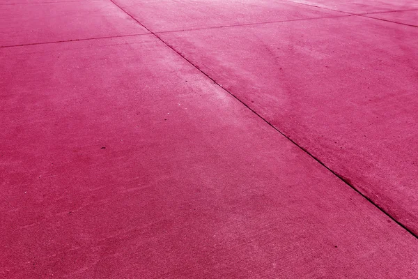Plancher de béton avion fugueuse fond rose — Photo