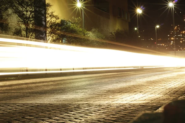 Městské rozmazané auto světla — Stock fotografie