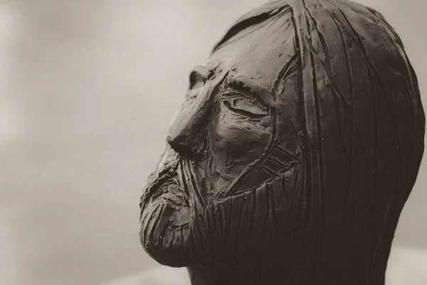 Photograph of Jesus Christ face clay sculpture