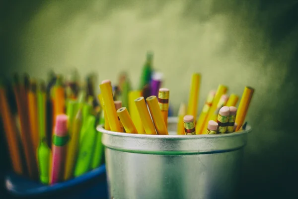 Pencils colors and markers on a blurred background — Stock Photo, Image