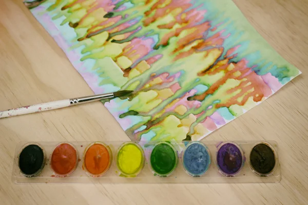 Watercolor paint and brush — Stock Photo, Image