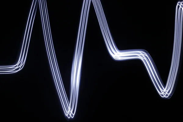 Desenho de linhas de luz abstrata — Fotografia de Stock