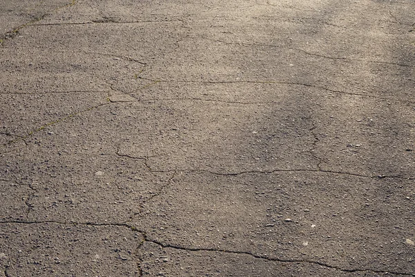 碎裂的沥青路面纹理 — 图库照片