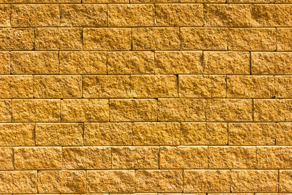 Ladrillo dorado pared fondo patrón textura — Foto de stock © nopparatz