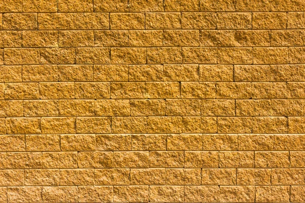 Ladrillo dorado pared fondo patrón textura — Foto de stock © nopparatz