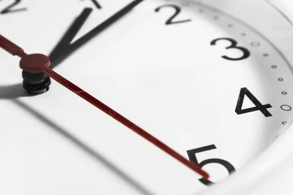 Closeup of hands on clock face.sensitive focus — Stock Photo, Image