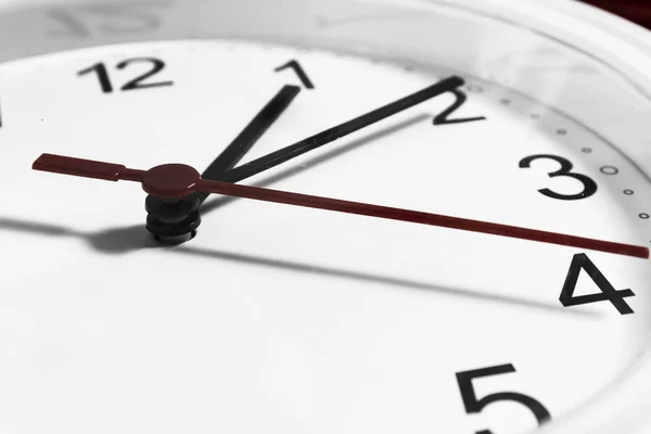 Closeup of hands on clock face.sensitive focus — Stock Photo, Image