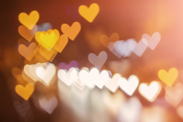Abstract hart bokeh achtergrond, liefde Valentine's dag achtergrond — Stockfoto