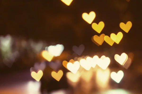 Abstract hart bokeh achtergrond, liefde Valentine's dag achtergrond — Stockfoto