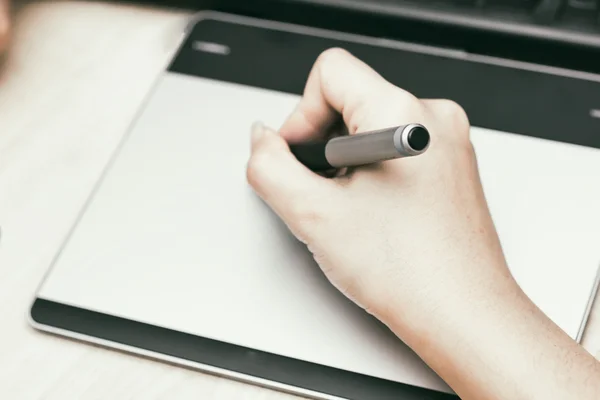 Retro image of female hand of a designer drawing — Stock Photo, Image