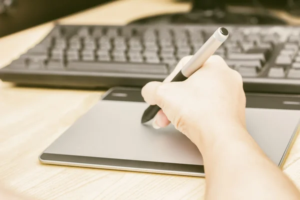 Retro image of female hand of a designer drawing — Stock Photo, Image