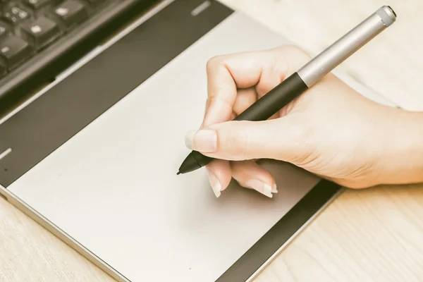 Retro image of female hand of a designer drawing — Stock Photo, Image