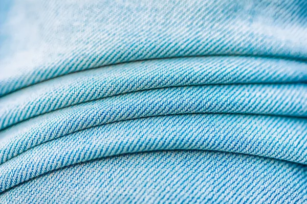 Blue jeans texture. Focus in the center of the frame — Stock Photo, Image